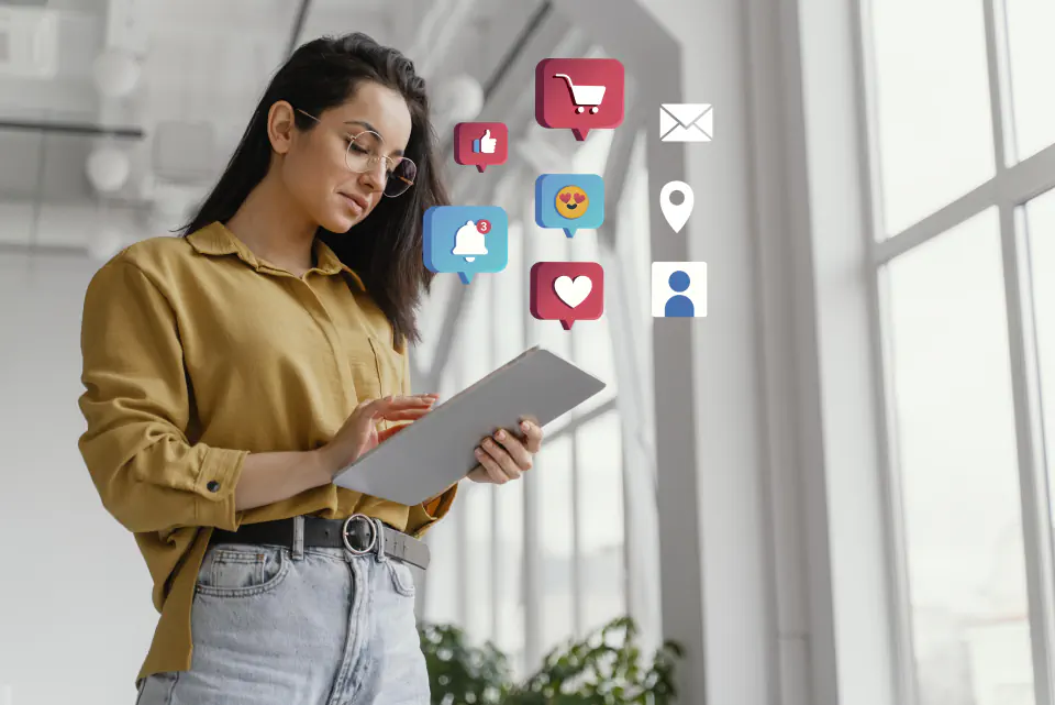 Social media marketer reviewing app engagement on a tablet