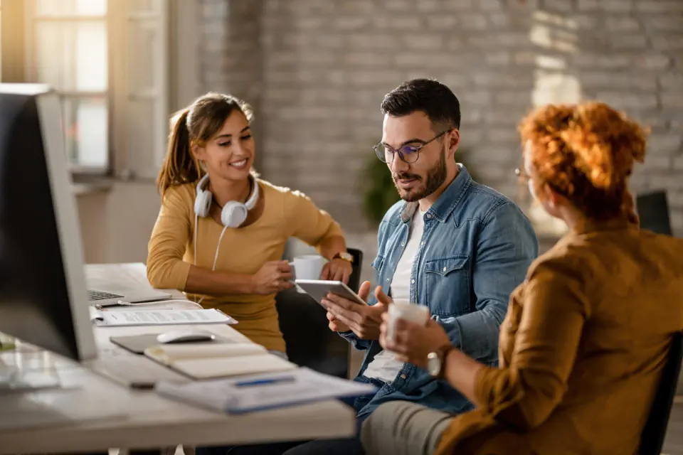 Business team discussing strategy in a bright office